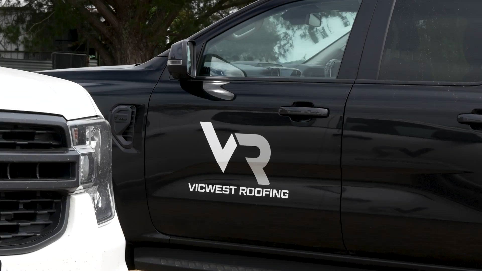 Vicwest Roofing crew working on a roof